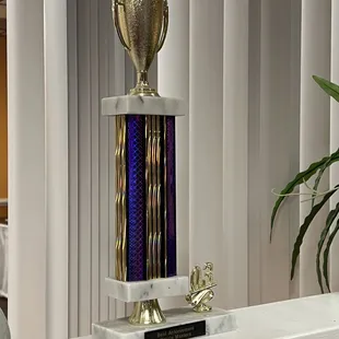 a trophy on a counter top