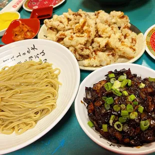 a variety of asian food on a table