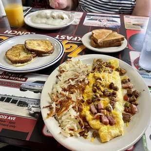 Missouri omelette, French toast, biscuits and white gravy, regular wheat toast, still more coming!