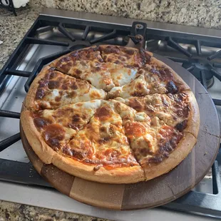 a pizza on a wooden board