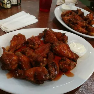 12 wings with hot sauce.