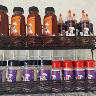 a shelf of sauces and condiments
