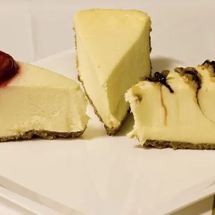 a slice of cheesecake with a cherry on top