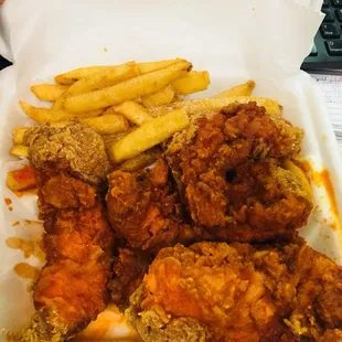 Spicy chicken and fries, missing the bread