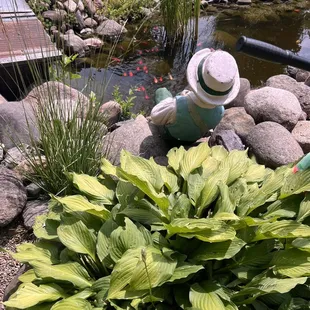 Nearby outdoor tables give a pleasant view of the garden &amp; pond
