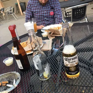 a man sitting at a table with food