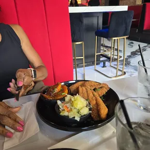 Catfish,cabbage, sweet potatoes.