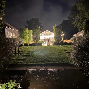 a view of the back yard at night