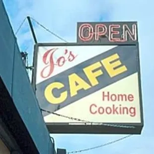 Old sign, now on side of building