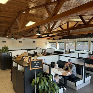 View from the entrance. Booth's isolated for privacy and less noise.