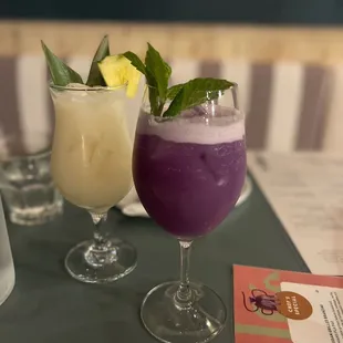 Phuket fizz (purple drink in front) Talk of the town (back)