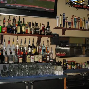 a bar full of liquor bottles