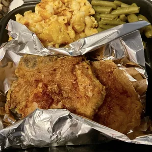 Pork chop  with Mac 'n Cheese and Green Beans.