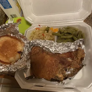 2 pork chops, green beans, cabbage, and cornbread.
