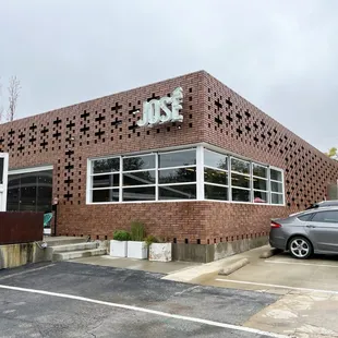 a car parked in front of a building