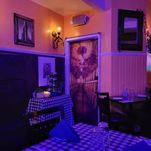 a dining room with a checkered table cloth