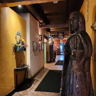 a statue of a woman holding a child