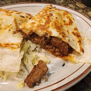 Single steak quesadilla. Meat was very tender and much bigger than expected.