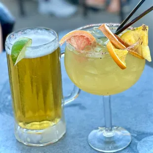 a glass of beer and a glass of lemonade