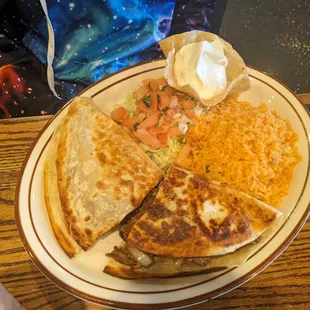 Monster Quesadilla with meat and no peppers.