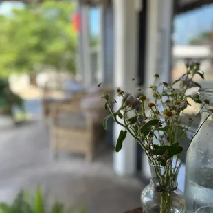 a vase of flowers on a table