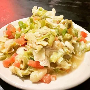 a plate of salad on a table