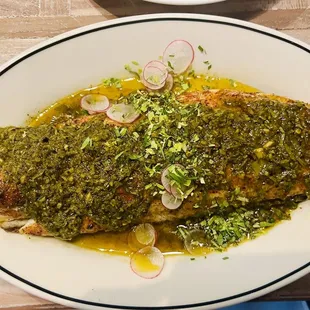 Half shell grilled red fish