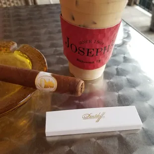 A Davidoff Churchill robusto &amp; Texas Pecan iced coffee.