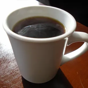 Starting things off with a piping hot cup of coffee - they leave a pot at your table.