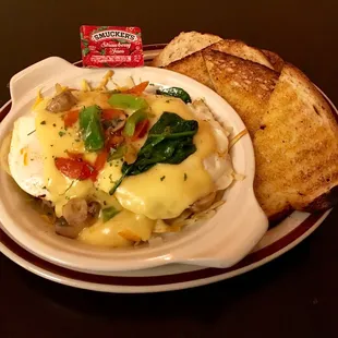 Build your own skillets. Spinach, cheese, tomato, green peppers, onions, mushrooms, sausage, bacon, ..... you build it.