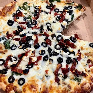 Medium pizza with olive oil, sundried tomatoes, spinach, blk. olives, feta &amp; mozzarella. SOOOO good!!