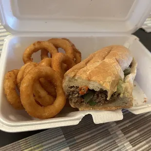 Steak and cheese with peppers, onion and jalapeño. With onion rings