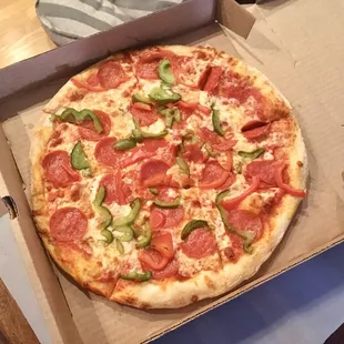 Small pizza with pepperoni, bell peppers