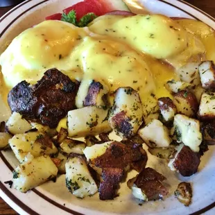 Classic (three) eggs Benedict with home fries