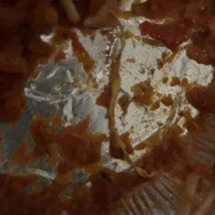 Chicken parmigiana dinner with a dash of bread tie.