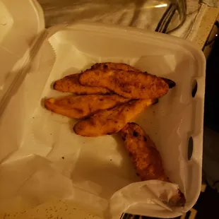fried chicken in a styrofoam container