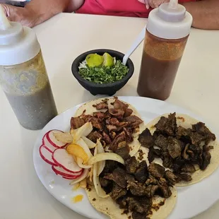 Carne asada and tripa tacos