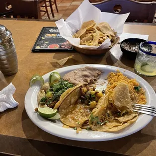 Tacos Al Pastor, chips and salsa, with my favorite margarita, as described in my post