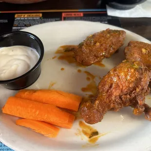 Their NEW chicken wings! - the Mexican buffalo sauce is so good. About a medium heat. The batter is so crispy and crunchy. Will order again!