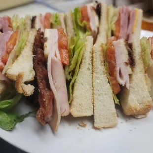 a plate of sandwiches
