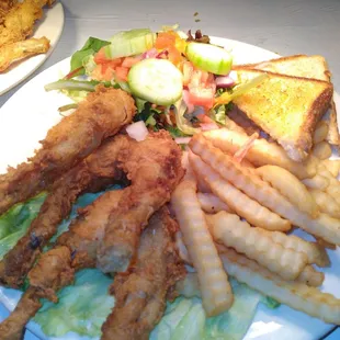 Dip fry frog legs side salad and fries