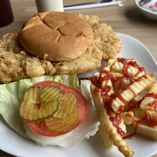 1/2 Breaded Pork Tenderloin sandwich with half order of fries. Nice and fresh.