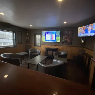 a view of a bar and television