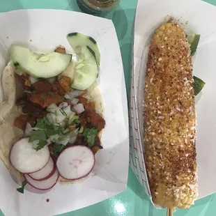 Elote and carne taco on flour tortilla