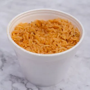 a plastic cup of rice