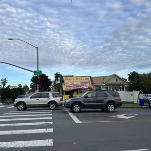 a view of a street with cars and a bus