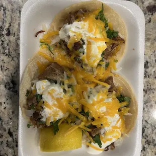Carnitas supreme tacos