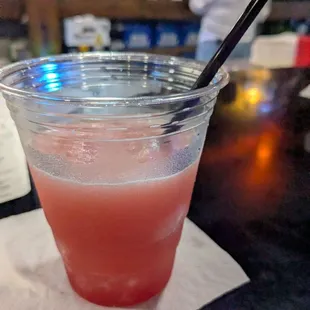 Frozen rum runner with a shot in the straw