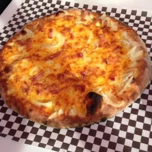 Breakfast Pizza! Hashbrowns, Egg, Colby Jack and just a hint of Sriracha - served all day long.
