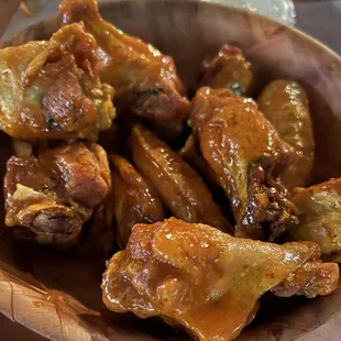 a bowl of chicken wings